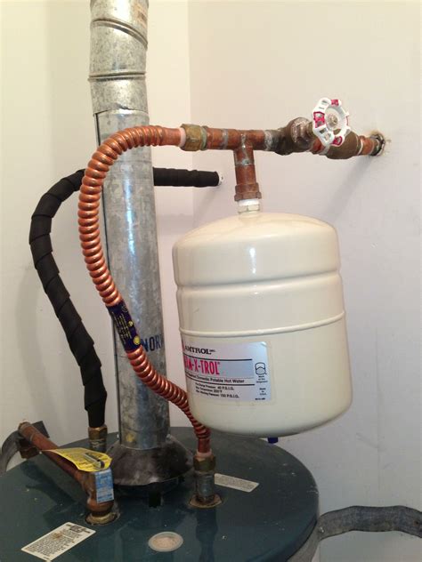 expansion tank leaking from bottom|How to Fix Common Water Heater Expansion Tank。